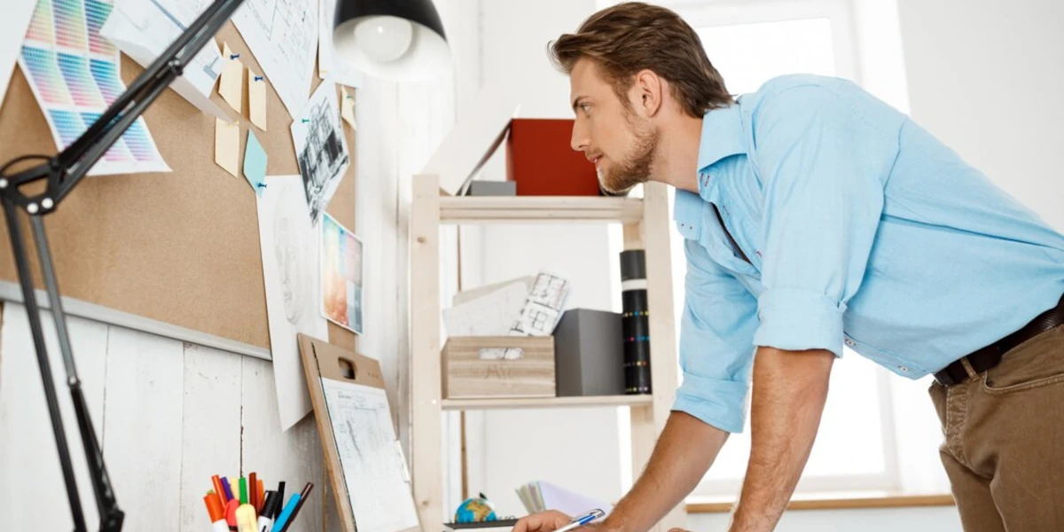 Man looking flat on wall